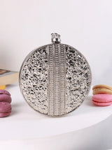 Black brass clutch bag from The Tan Clan featuring a sleek, minimalist design for elegant occasions.