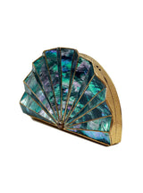 Opal brass clutch by The Tan Clan showing a sleek, polished brass clutch with a minimalist design for elegant evening use.