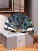 Opal brass clutch bag by The Tan Clan, featuring a sleek design with a polished metallic finish and compact style.