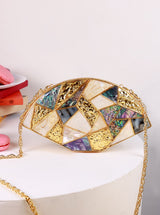 Multicolor brass clutch bag by The Tan Clan with a sleek design, perfect for stylish accessories or evening outings.