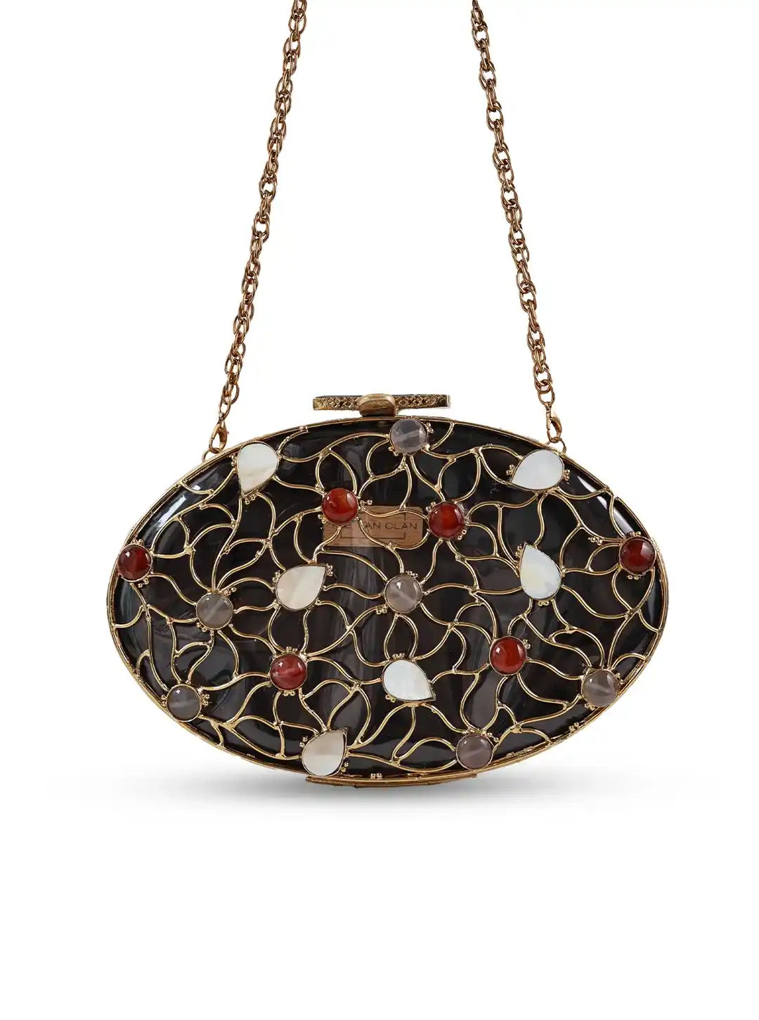 The Tan Clan Rhea Brass Clutch featuring a sleek metallic finish and elegant design for stylish evening accessories.