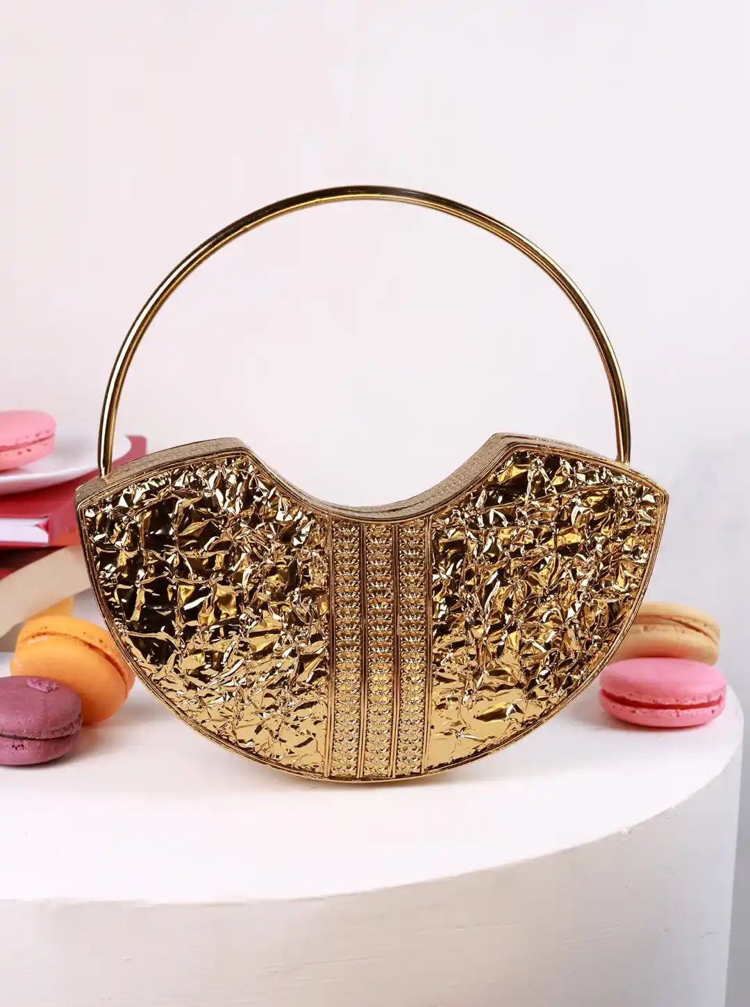 Sasha Brass Clutch with Handle by The Tan Clan, stylish metallic clutch bag with a strap for easy carrying.
