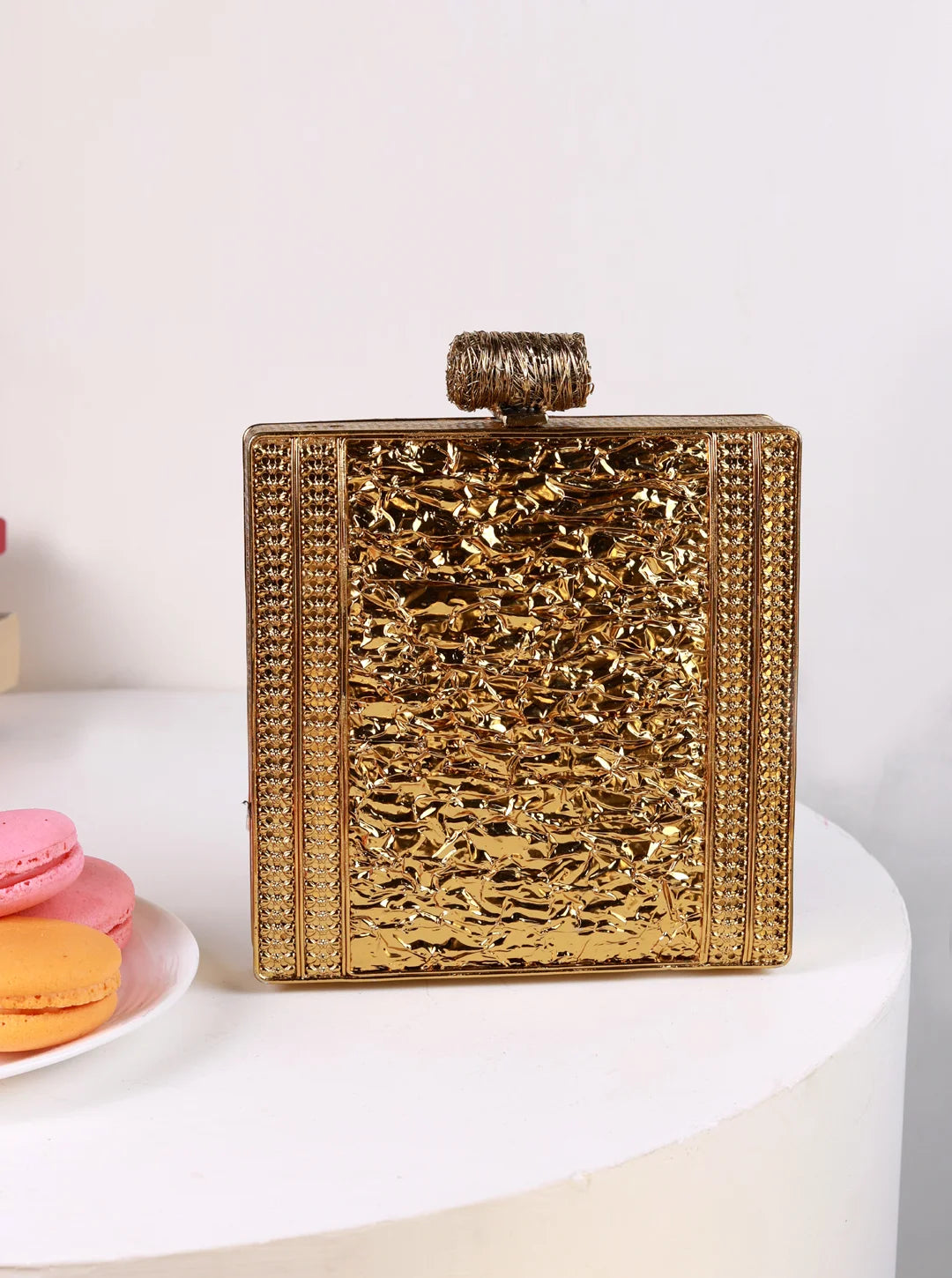 Sugar Embellished Brass Clutch by The Tan Clan, featuring intricate details and a compact, elegant design for evening wear.