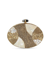 The Tan Clan Tracy Brass Clutch showing a sleek, metallic clutch with a smooth finish and minimalist design.