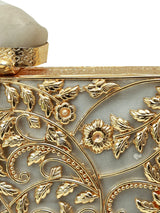 Uzma intricate brass clutch by The Tan Clan featuring detailed craftsmanship and elegant design for stylish occasions.