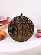 Vana Brass Clutch by The Tan Clan featuring a sleek, polished brass design with a compact, stylish silhouette.