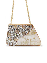 Vixi embellished brass clutch by The Tan Clan featuring intricate metal detailing and a sleek, elegant design for evening wear.