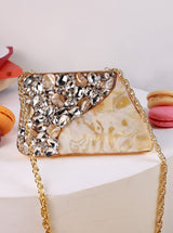 Vixi embellished brass clutch by The Tan Clan, featuring intricate detailing and a sleek design for elegant occasions.