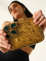 Elegant Zen Brass Clutch by The Tan Clan featuring a sleek brass finish and compact design, perfect for evening accessories.