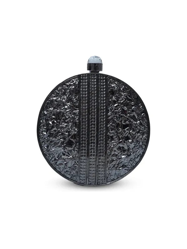 Aashna round embellished brass clutch with intricate design, showcasing a stylish accessory for special occasions.