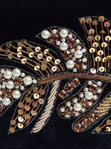 Afrah Hand Embroidered Leaf Clutch by The Tan Clan featuring detailed embroidery and a stylish design for elegant occasions.