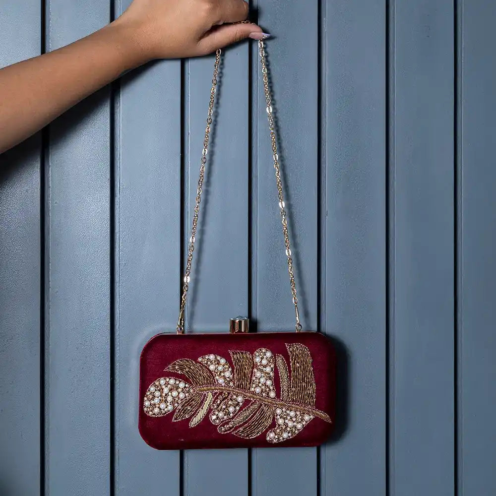 Afrah hand-embroidered leaf clutch by The Tan Clan, featuring intricate embroidery and a compact, elegant design.