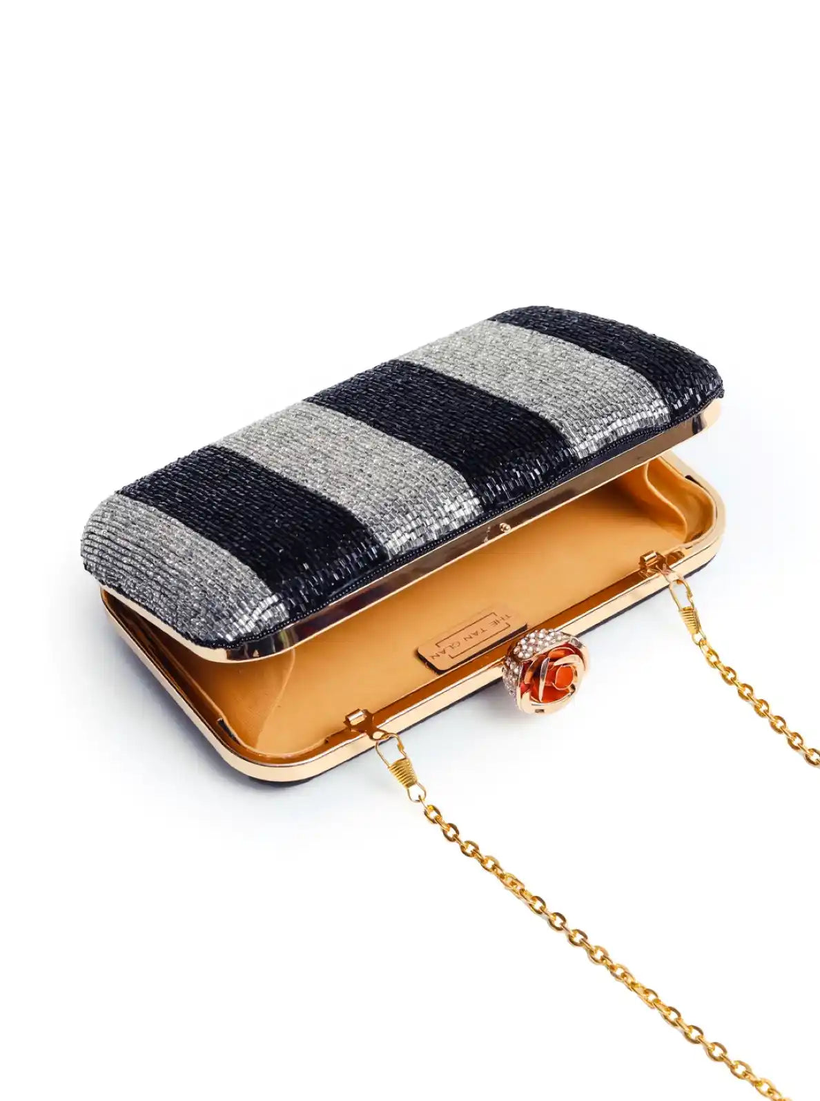 Afshaan hand embroidered clutch by The Tan Clan featuring intricate embroidery and a stylish, compact design for elegant occasions.