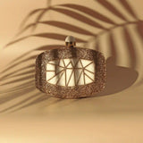 Alia Mother of Pearl Clutch by The Tan Clan featuring a shimmering pearl exterior and elegant design for evening occasions.