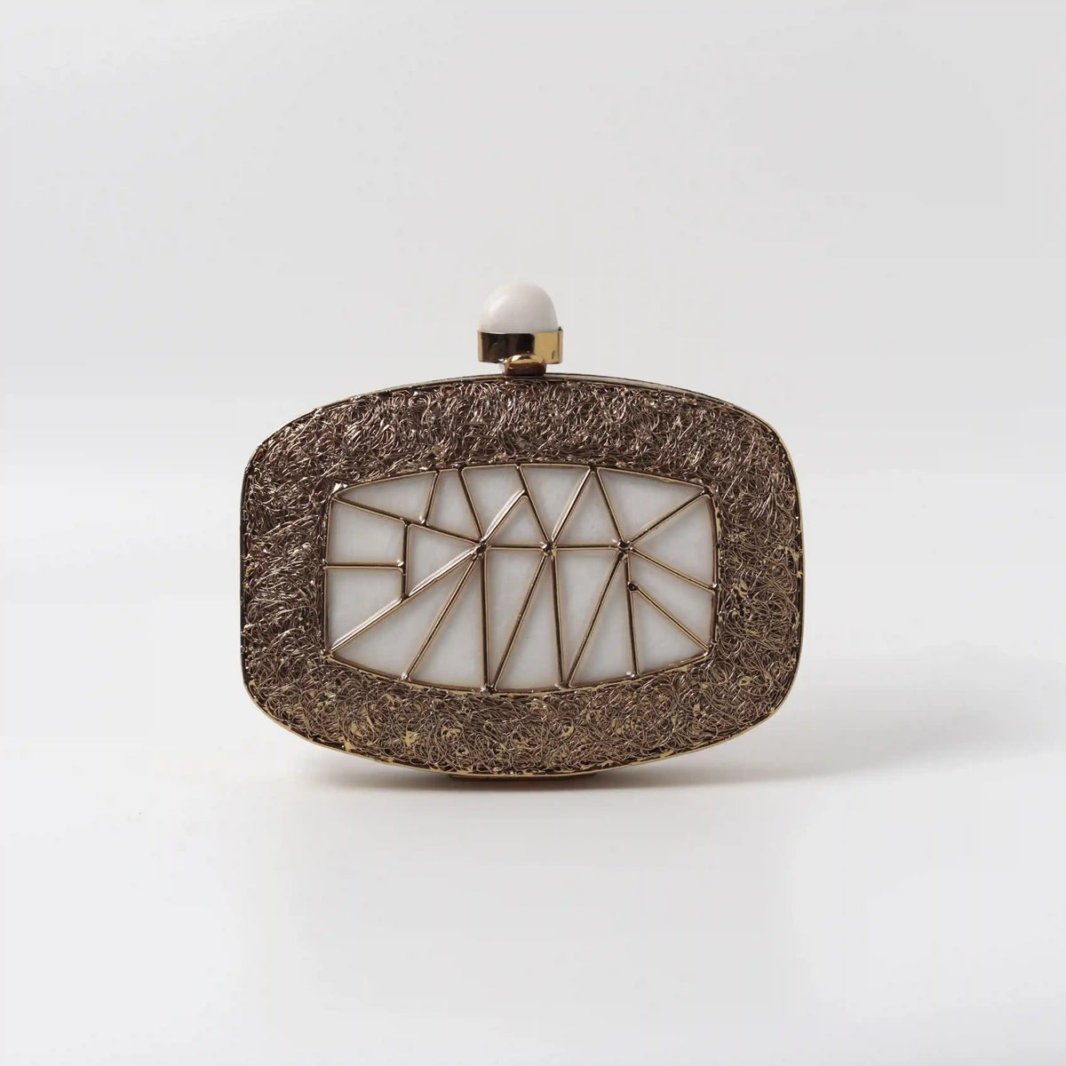 Alia Mother of Pearl Clutch by The Tan Clan, showcasing a shimmering pearl finish and elegant design for evening wear.