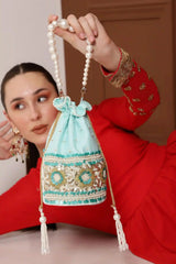 Ama Potli Bag with Pearl Handle by The Tan Clan, featuring elegant pearl accents and traditional drawstring closure.