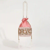 Ama Potli Bag with pearl handle from The Tan Clan, featuring traditional design and elegant pearl accents.
