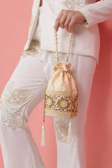 Ama Potli Bag with pearl handle from The Tan Clan, featuring intricate embroidery and elegant design for special occasions.