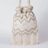 Amaal Potli bag with handle from The Tan Clan, featuring intricate embroidery and traditional design for festive occasions.