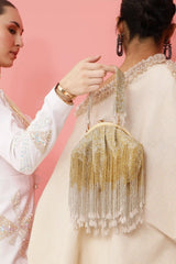 Amour Batua Bag by The Tan Clan with a detachable handle, featuring a stylish design and spacious interior.