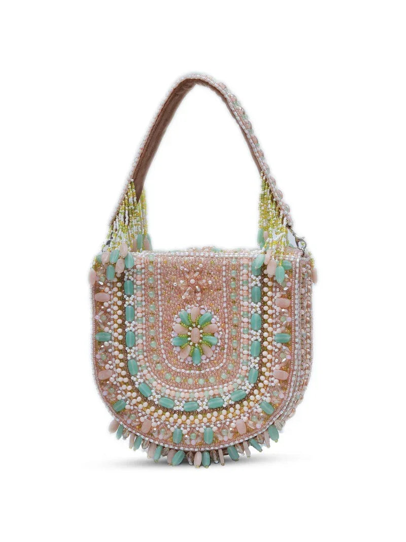 Brown Amulya flap-over bag with handle by The Tan Clan, featuring a stylish design and secure flap closure.