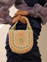 Tan Clan Amulya flap-over handbag with handle, stylish leather bag featuring a flap closure and adjustable shoulder strap.