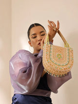 Tan Clan Amulya flap-over handbag with handle, featuring a stylish design and spacious interior for daily use.