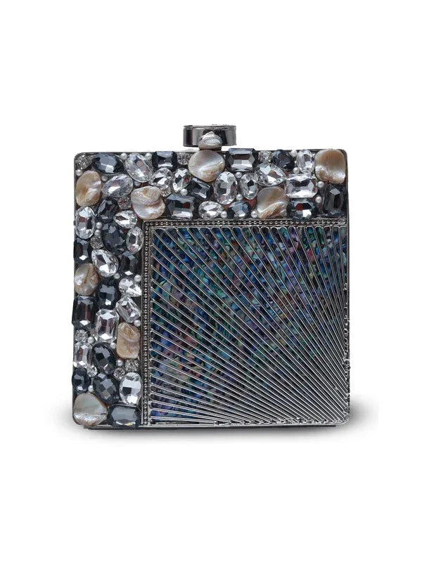 Aqua embellished brass clutch bag with intricate design, featuring detailed accents and a sleek, elegant shape.