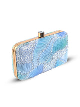 Aqua blue box clutch by The Tan Clan with a sleek, square design and minimalist style, perfect for evening events.