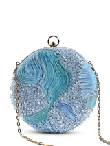 Aqua blue round clutch bag by The Tan Clan featuring a smooth, glossy finish and minimalist design for elegant occasions.
