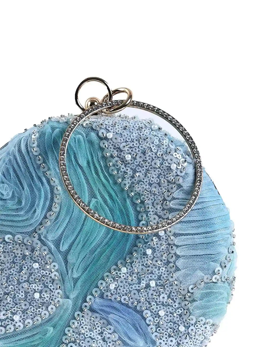 Aqua blue round clutch bag by The Tan Clan with a sleek, smooth surface and minimalist design, perfect for stylish evenings.