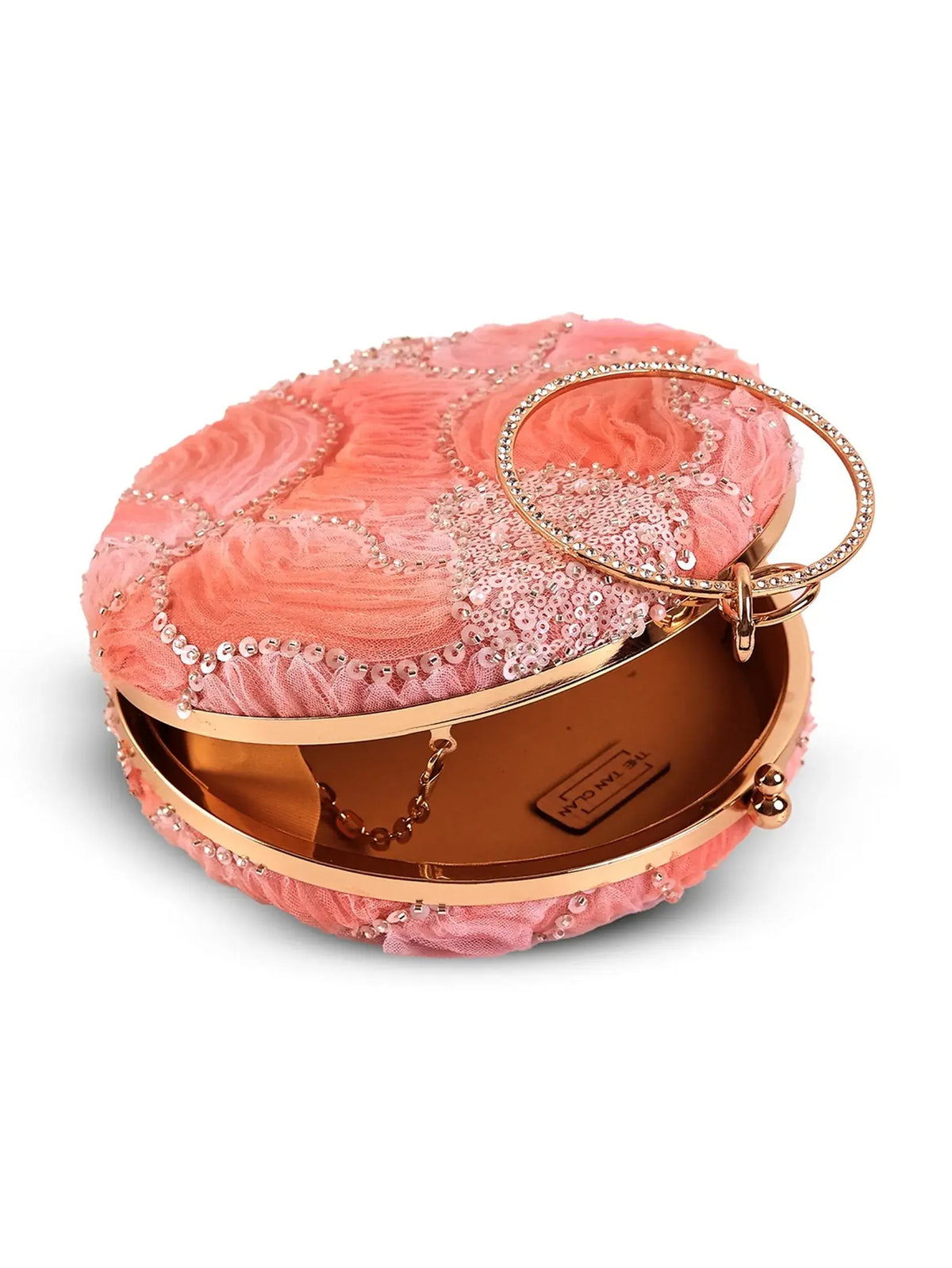 Aqua orange round clutch bag by The Tan Clan with a smooth finish and compact design for stylish accessories.