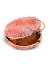 Aqua orange round clutch bag by The Tan Clan with a smooth finish and compact design for stylish accessories.