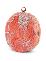 Aqua orange round clutch bag by The Tan Clan with a smooth surface and compact design, perfect for stylish accessories.