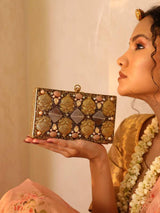 Arya embellished brass clutch with intricate design and decorative accents, crafted by The Tan Clan.