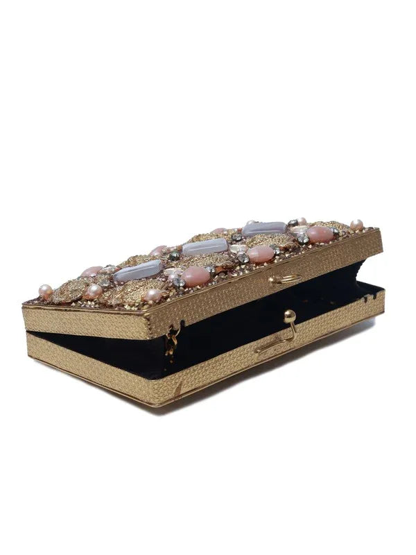 Arya Brass Clutch by The Tan Clan featuring intricate embellishments and a sleek design, perfect for elegant occasions.