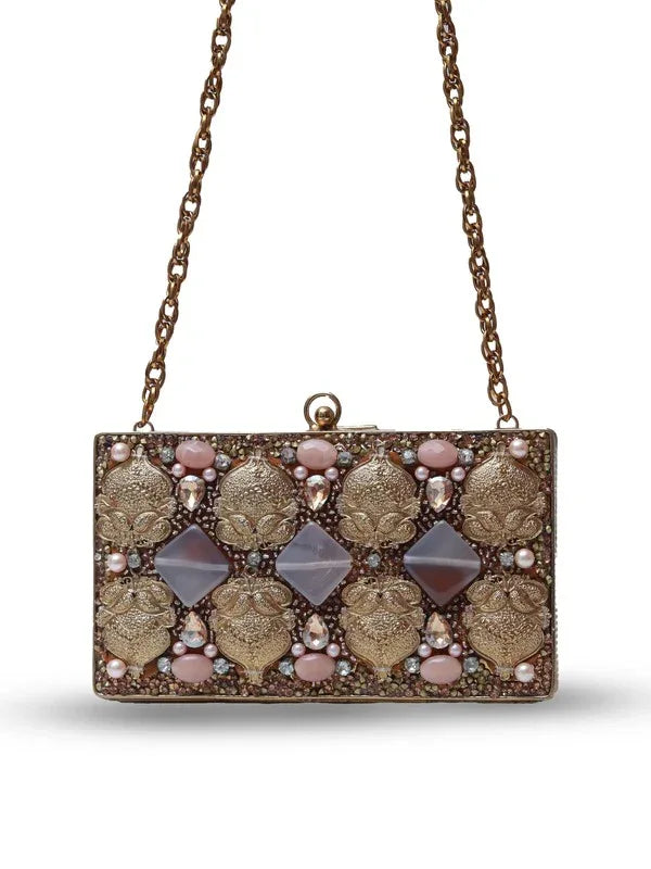 Arya embellished brass clutch by The Tan Clan featuring intricate metalwork and a sleek, elegant design.