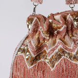 Asmi Potli bag with tassels and handle by The Tan Clan, featuring traditional embroidery and decorative design.