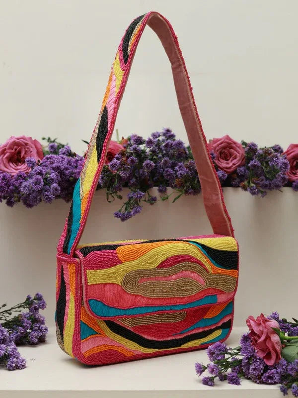 Multicolor Aster Baguette Bag with Handle by The Tan Clan, featuring vibrant woven design and stylish carry handle.