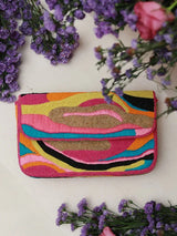 Multicolor Aster Baguette Bag with handle by The Tan Clan, featuring vibrant woven design and compact, stylish silhouette.