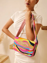 Multicolor Aster Baguette Bag with handle by The Tan Clan, featuring a vibrant, multicolored design and stylish shoulder strap.