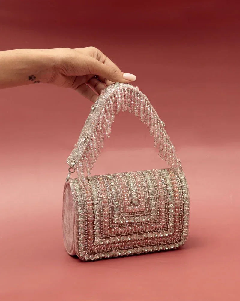 Aura Combo by THE TAN CLAN featuring a white Mother of Pearl clutch and a pink Nysa flap bag, both stylish and elegant accessories.