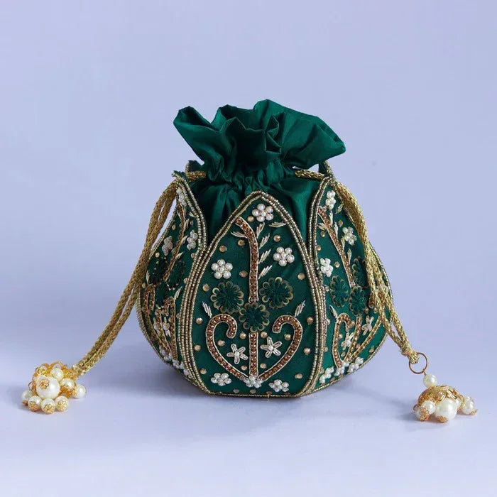 Hand-embroidered mini lotus potli bag by The Tan Clan with intricate embroidery and traditional design.