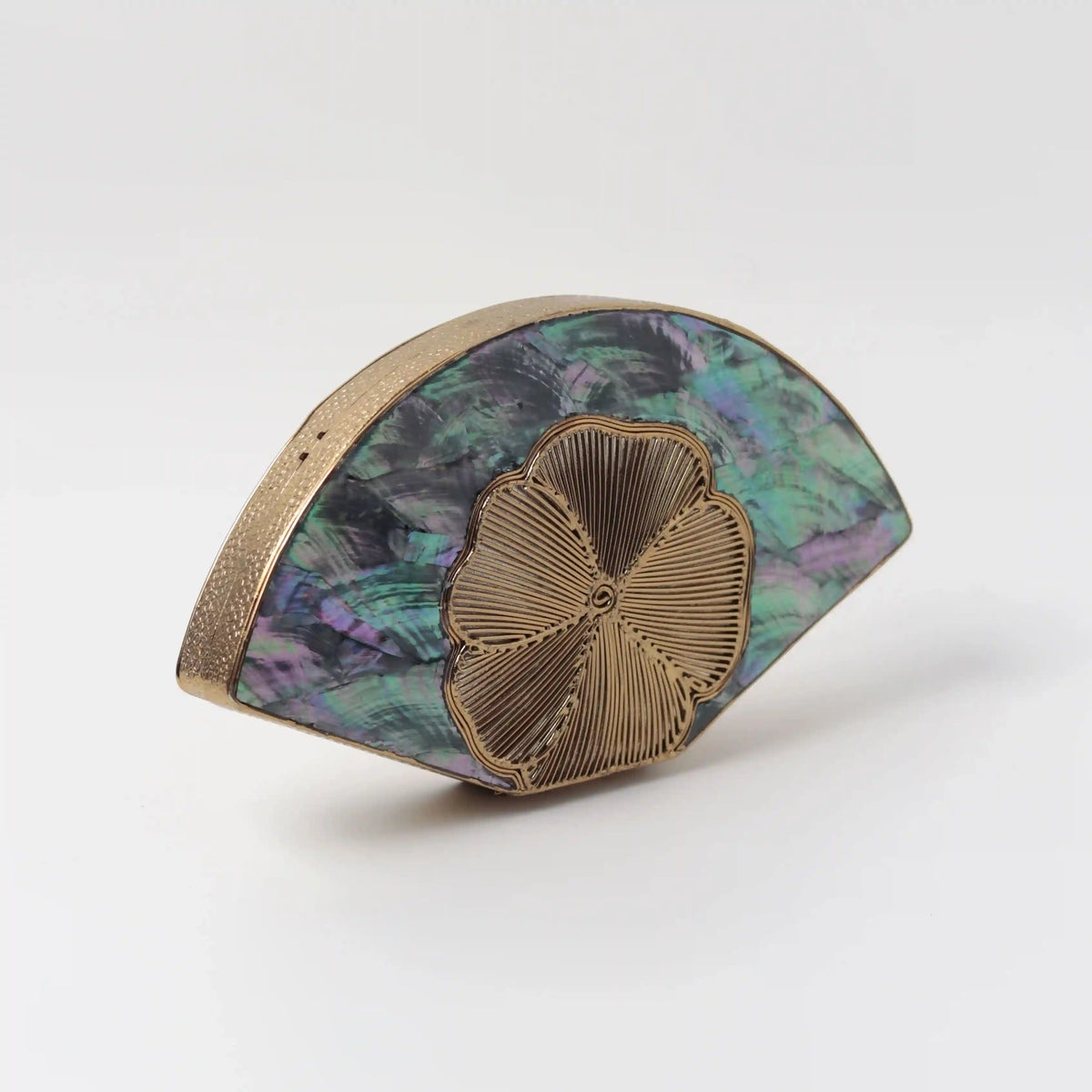 Bahaar brass wirework clutch with mother of pearl detailing by The Tan Clan, showcasing intricate craftsmanship and elegant design.