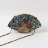 Bahaar brass wirework mother of pearl clutch by The Tan Clan featuring intricate design and elegant craftsmanship.