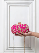 Hand-embroidered Baiza Zardozi clutch bag by The Tan Clan featuring intricate gold embroidery and traditional design.