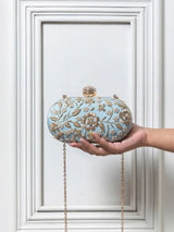 Hand-embroidered Baiza Zardozi clutch by The Tan Clan with intricate Zardozi embroidery on a sleek, elegant design.