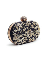 Hand-embroidered Baiza Zardozi clutch by The Tan Clan with intricate zari work and traditional design.