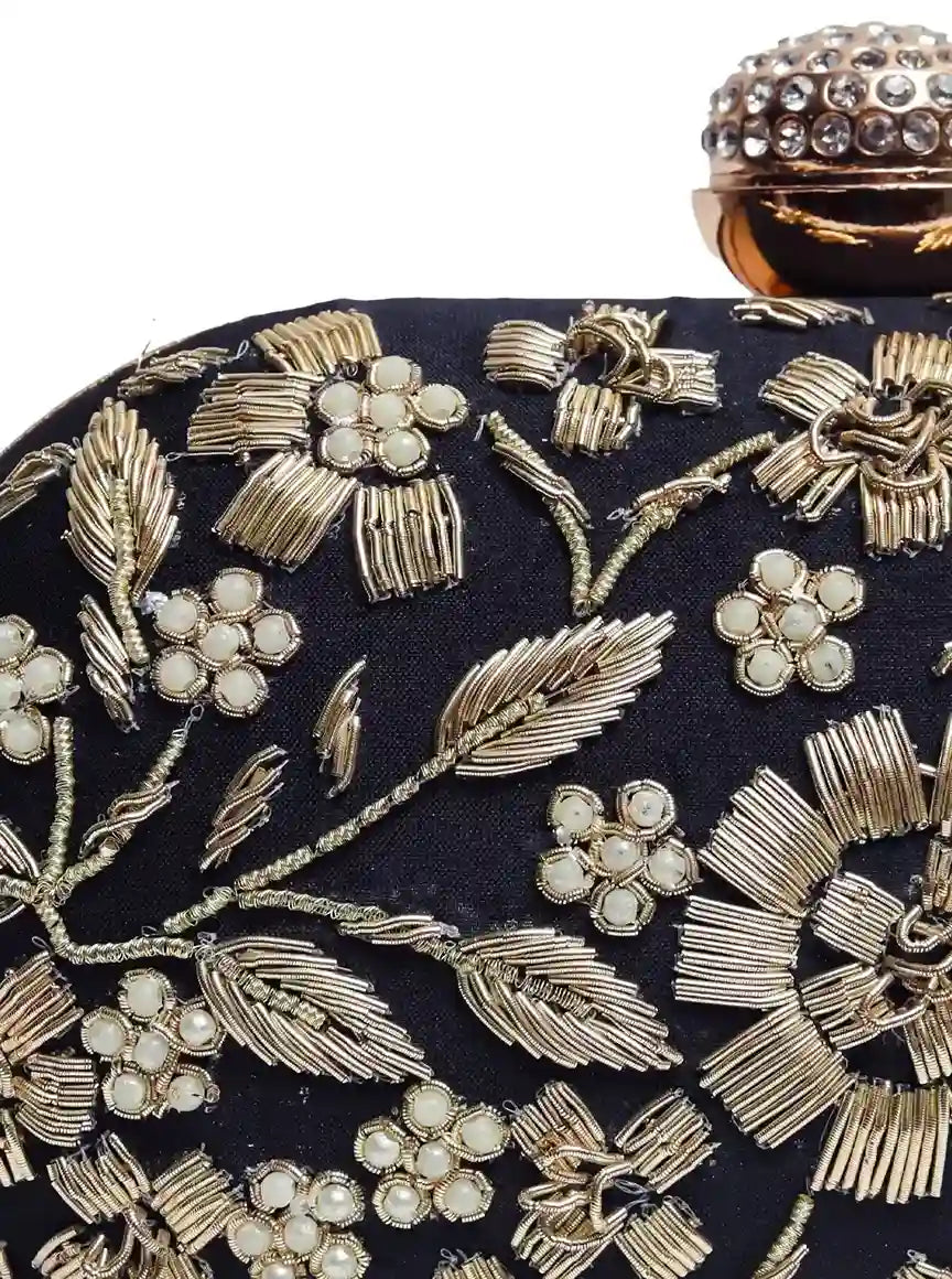 Hand-embroidered Baiza Zardozi clutch by The Tan Clan with intricate zardozi embroidery and a sleek, elegant design.