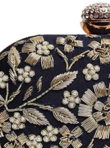 Hand-embroidered Baiza Zardozi clutch by The Tan Clan with intricate zardozi embroidery and a sleek, elegant design.